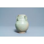 A Chinese Longquan celadon five-spouted urn, Song