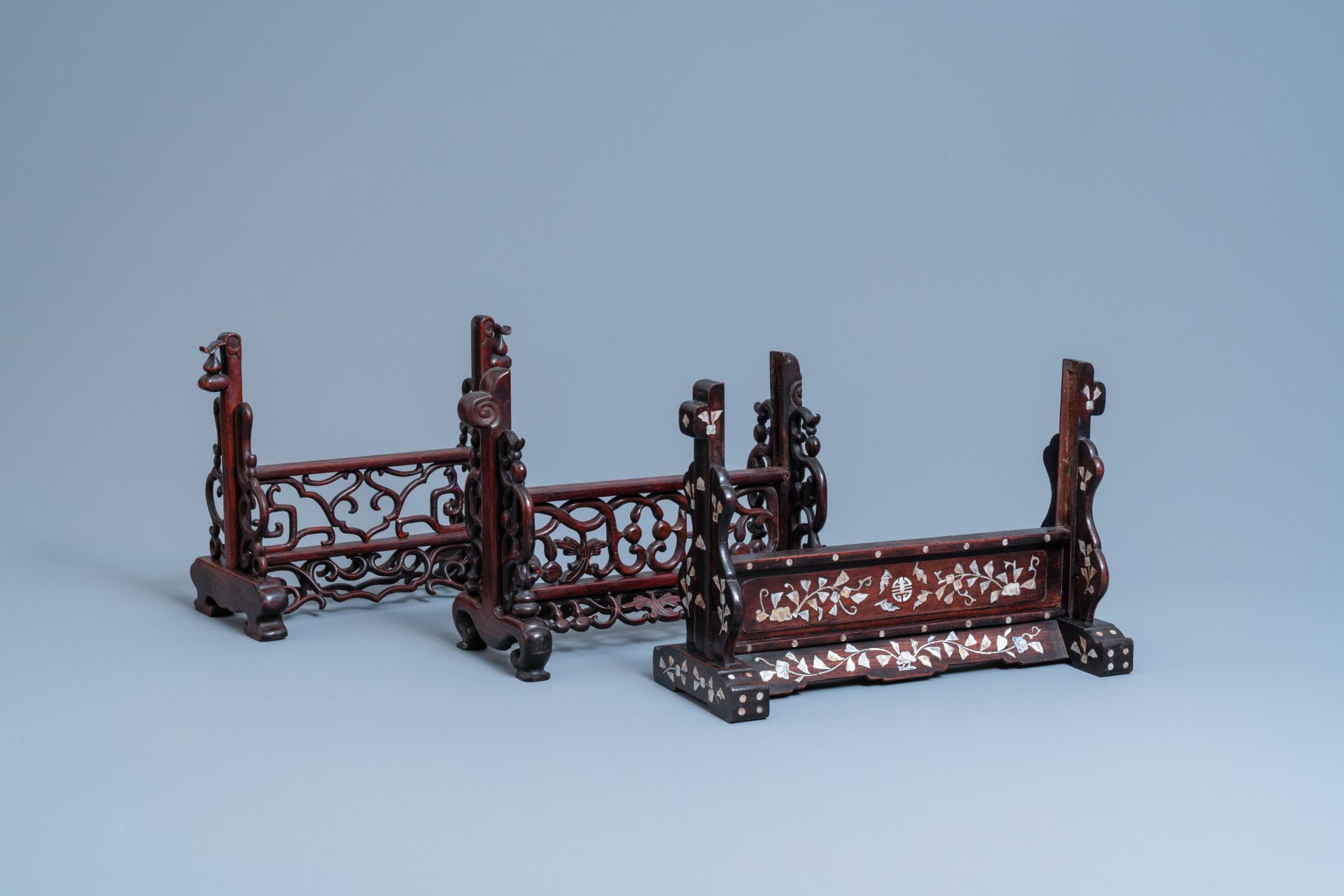 Three Chinese wooden table screen stands, 19th C.