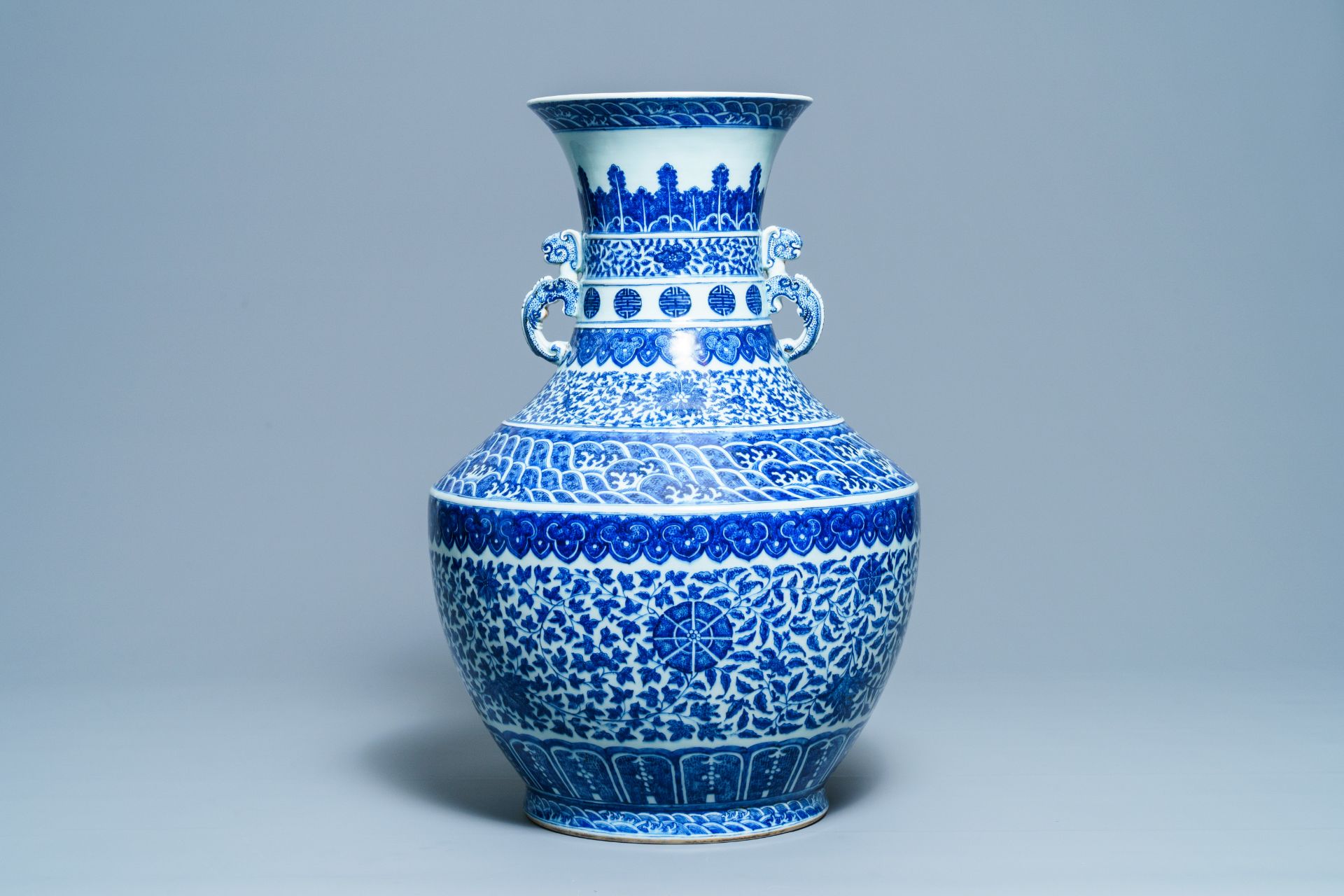 A large Chinese blue and white 'hu' vase with floral scrolls, Qianlong mark, 19th C - Bild 3 aus 6