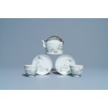 A Chinese qianjiang cai teapot and two cups and saucers, 19/20th C.