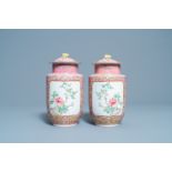 A pair of Chinese famille rose vases and covers, Hongxian mark, Republic