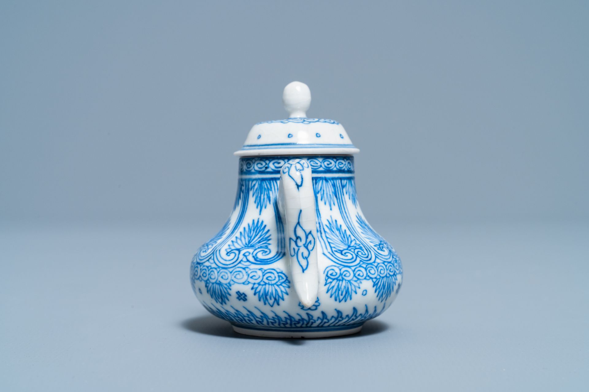 A Chinese blue and white soft paste miniature teapot, Kangxi - Image 3 of 7