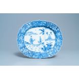 A large oval Chinese blue and white 'Romance of the Western Chamber' dish, Qianlong