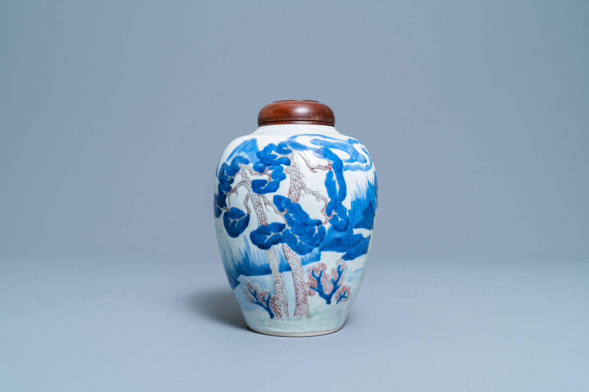 A Chinese blue, white, celadon and copper red vase with a landscape, Kangxi