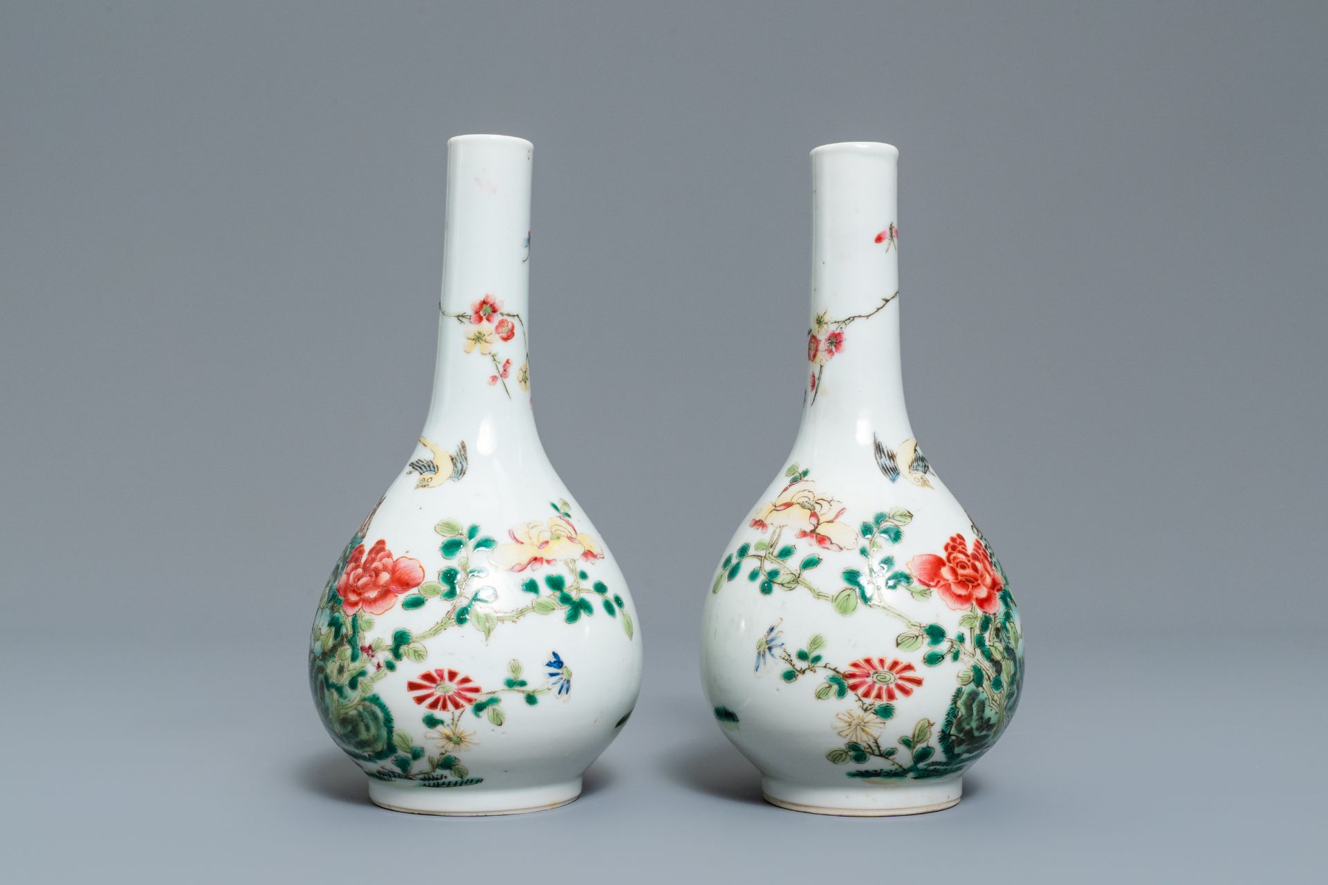 A pair of Chinese famille rose bottle vases, 19th C. - Image 5 of 10