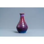 A Chinese flambé-glazed bottle vase, Yongzheng mark, 19th C.