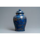 A large Chinese monochrome powder blue and gilt vase and cover, Kangxi