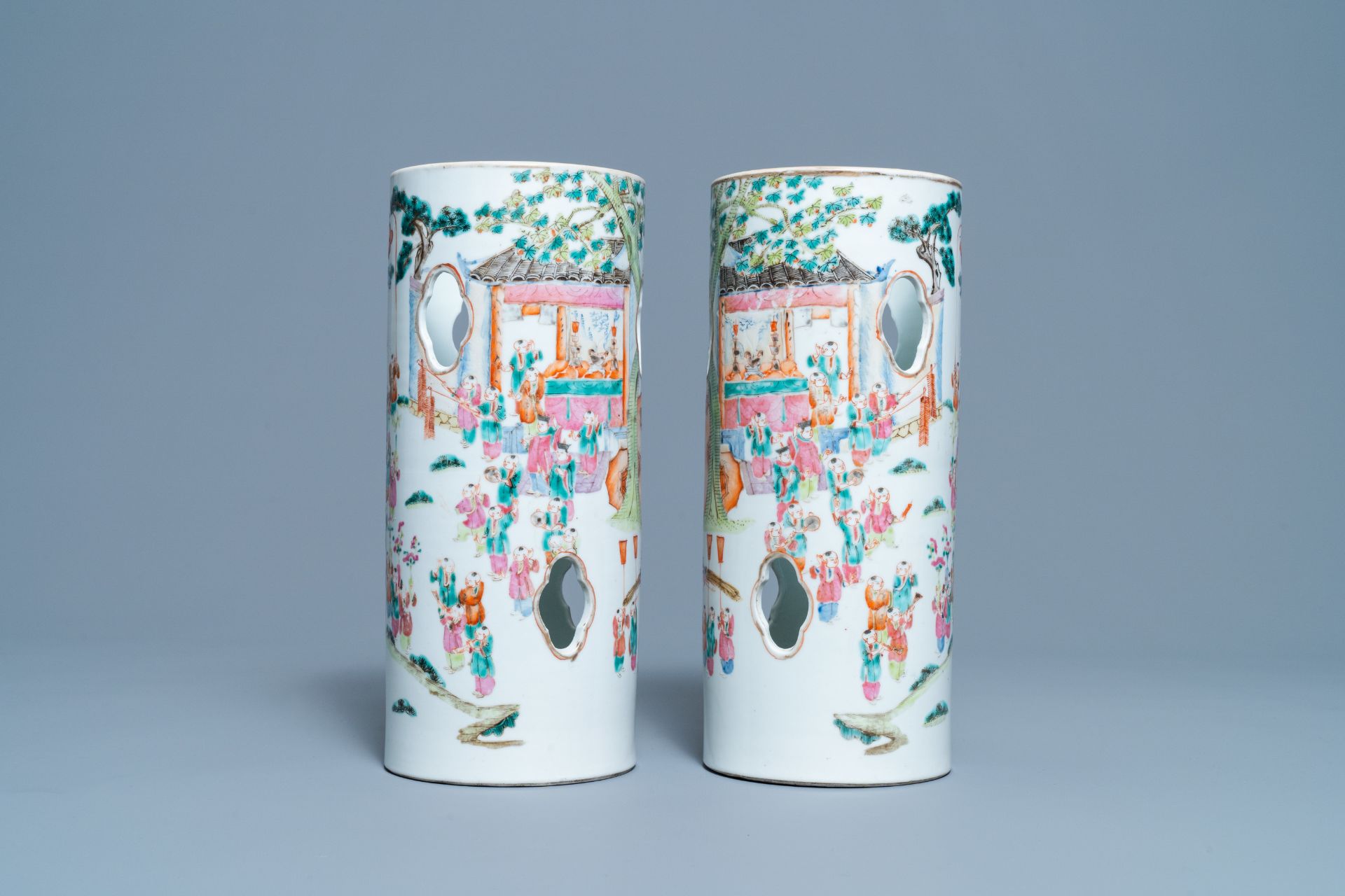 A pair of reticulated Chinese famille rose '100 boys' hat stands, Qianlong mark, 19th C. - Image 3 of 6