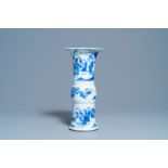 A Chinese blue and white 'gu' vase with immortals, Kangxi