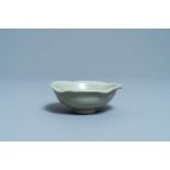 A Chinese Longquan celadon 'turtle in lotus flower' bowl, Song/Yuan