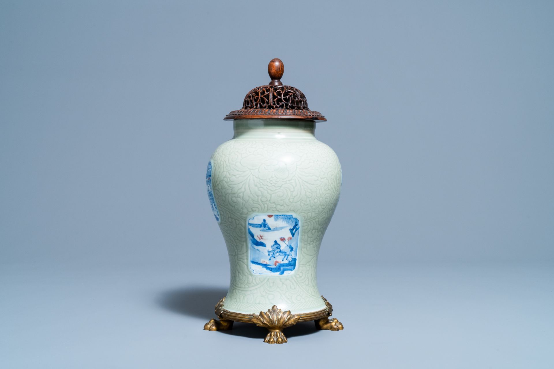 A Chinese incised celadon-glazed vase with blue, white and copper red panels, Kangxi