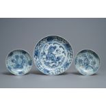 Three Chinese blue and white dishes with a qilin and rockwork, Hongzhi