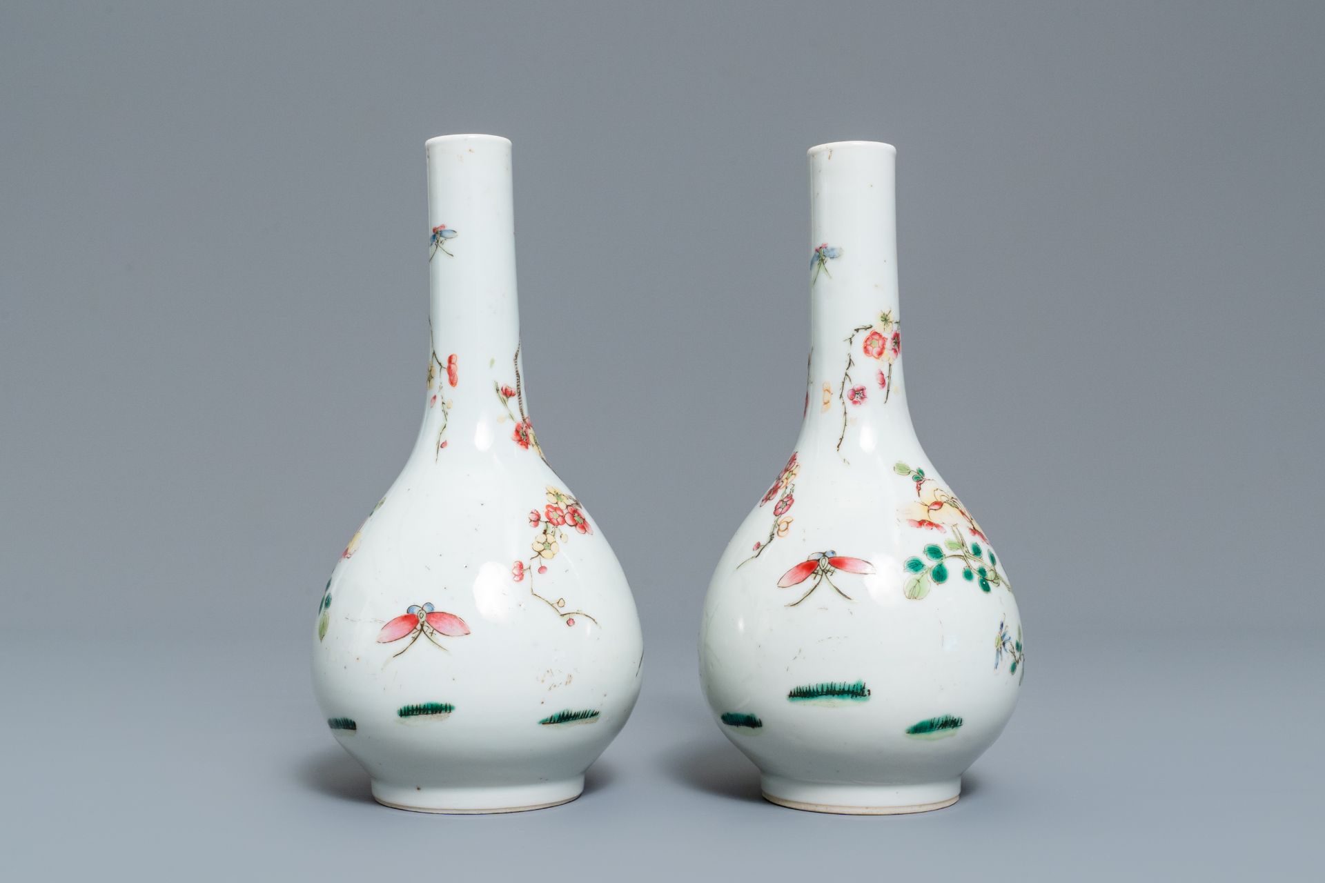 A pair of Chinese famille rose bottle vases, 19th C. - Image 3 of 10