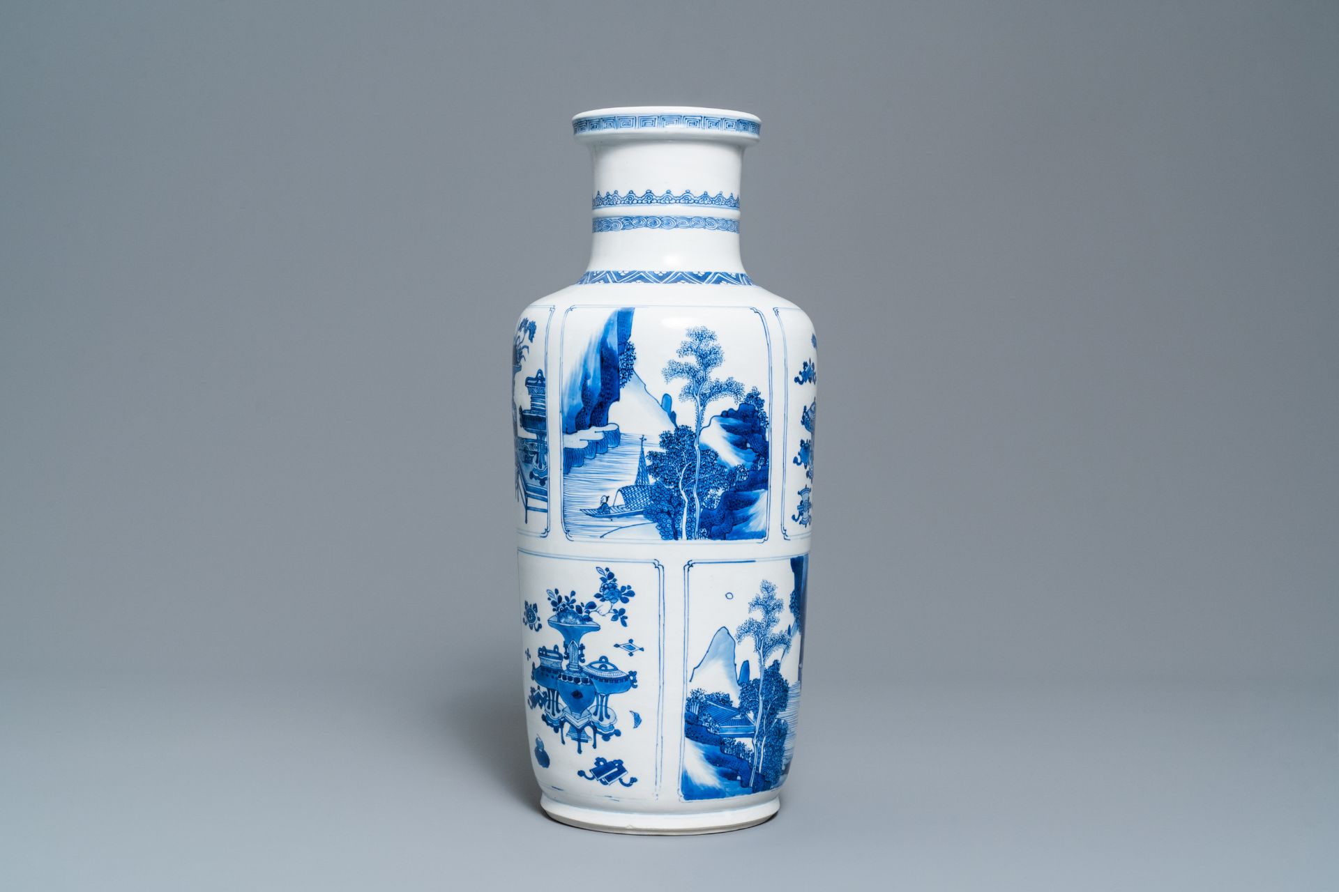 A Chinese blue and white 'antiquities and landscapes' rouleau vase, Kangxi - Image 5 of 35