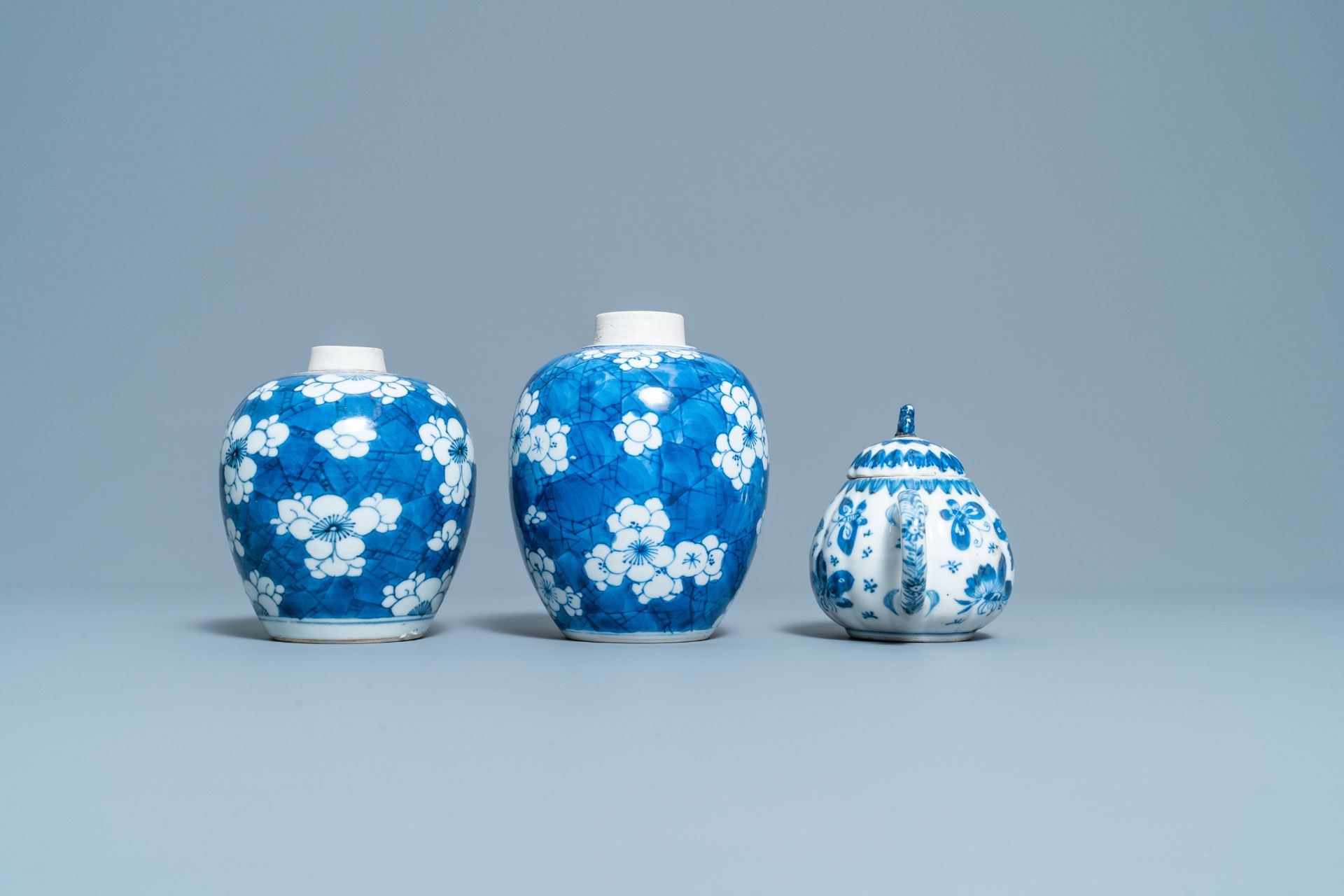 A pair of Chinese blue & white 'prunus' jars & a 'butterfly' teapot & cover, Kangxi - Image 4 of 8