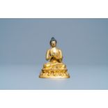 A Chinese gilt bronzen figure of Buddha, Kangxi