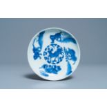 A Chinese blue and white 'mythical beasts' dish, Shunzhi mark and of the period