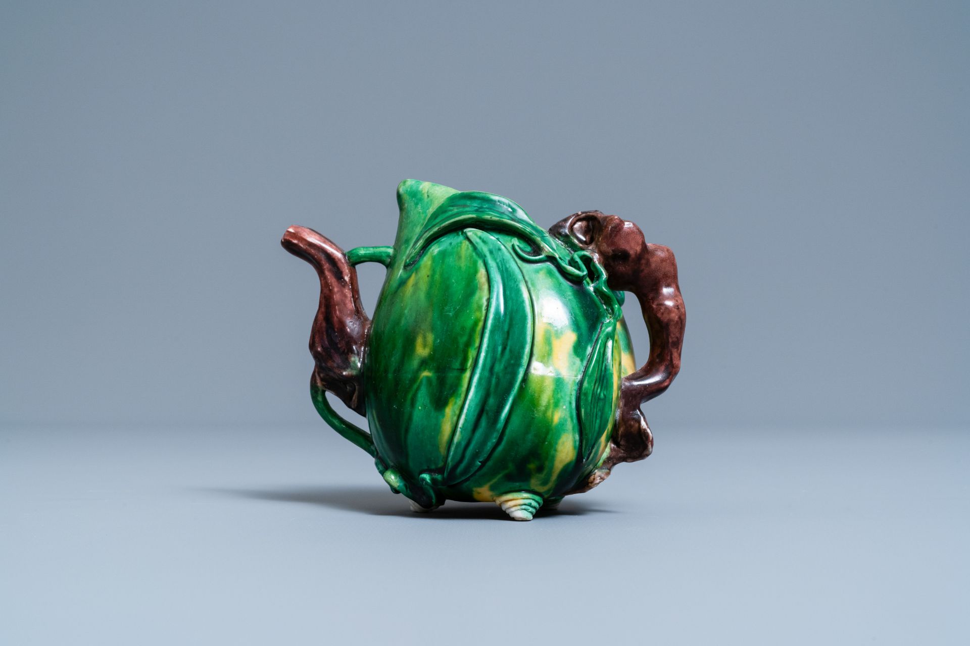 A Chinese verte biscuit peach-shaped 'cadogan' teapot, Kangxi - Image 2 of 7