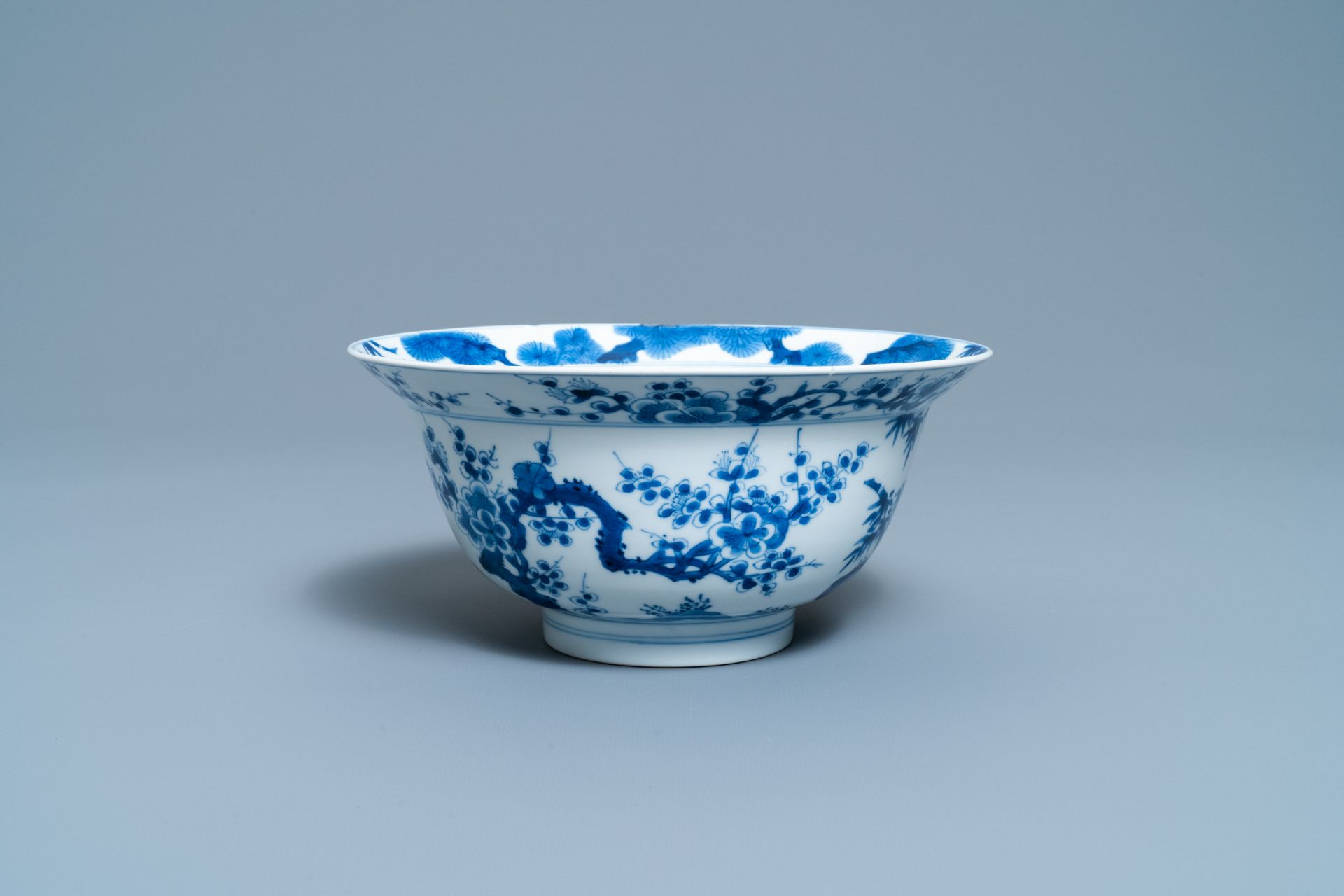 A Chinese blue and white 'Three friends of winter' bowl, Kangxi mark & period