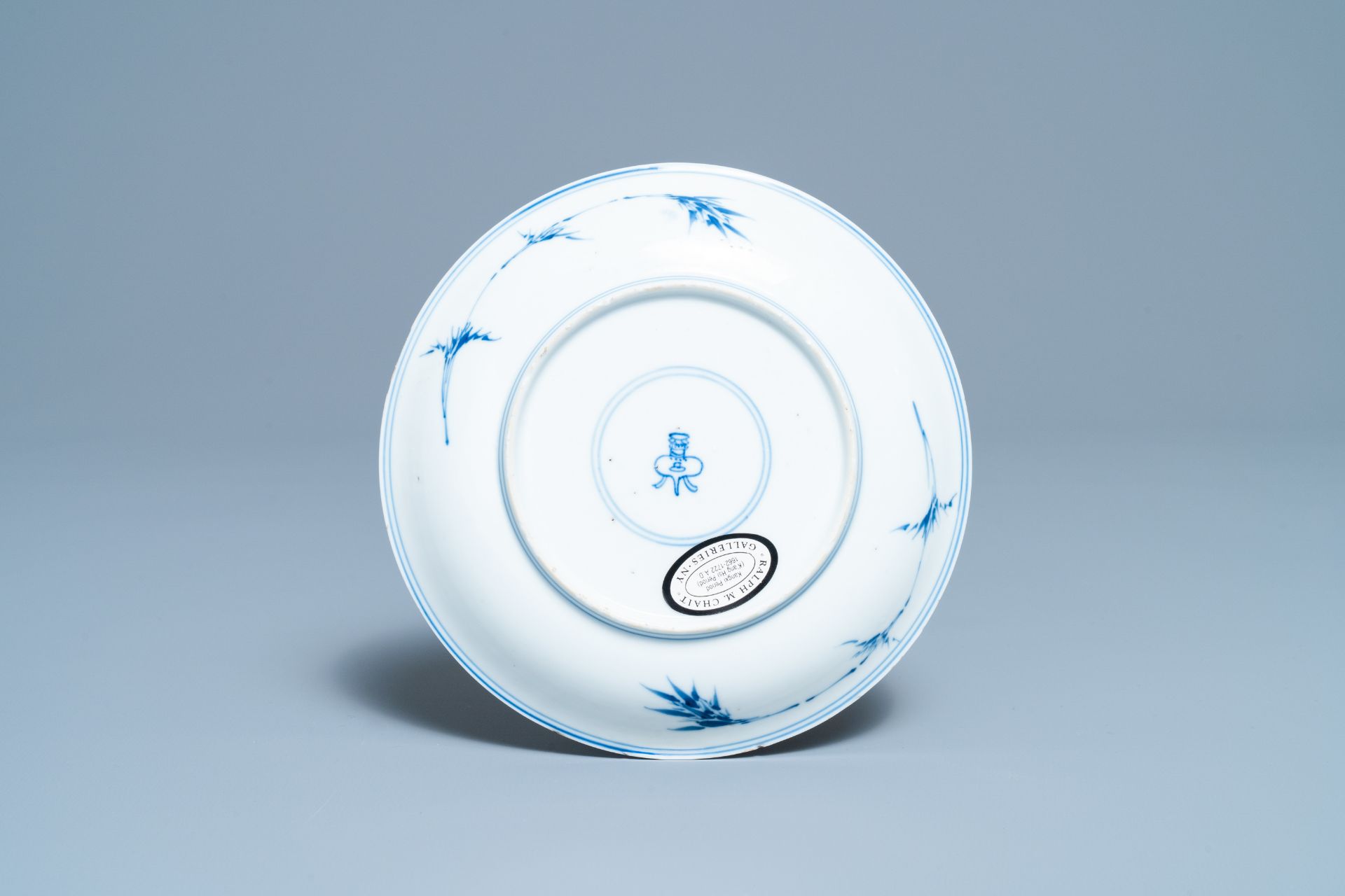 A Chinese blue, white and copper red saucer dish with floral design, Kangxi - Image 2 of 2