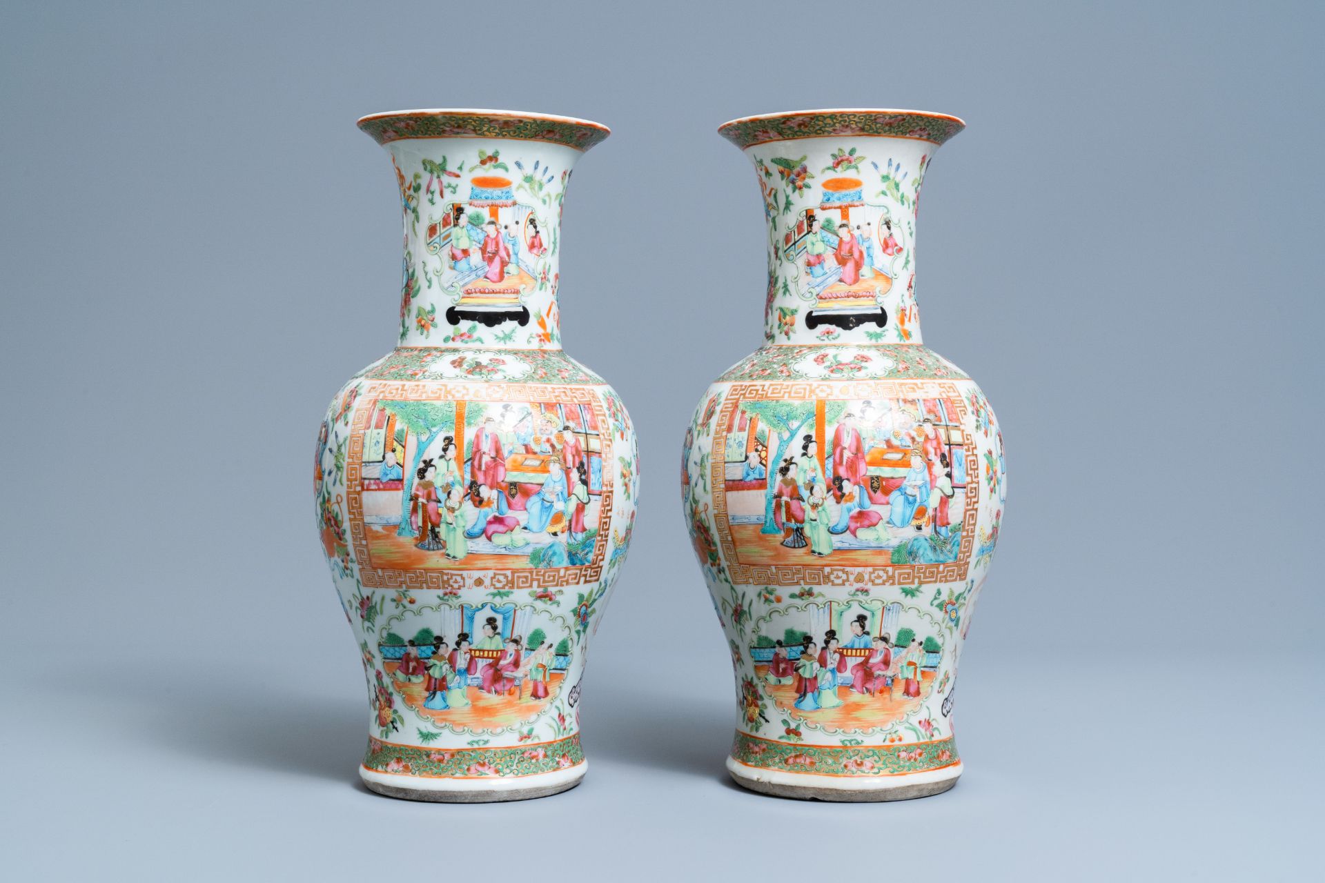 A pair of Chinese Canton famille rose vases, 19th C.