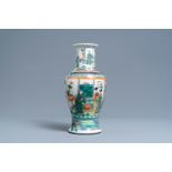 A Chinese famille verte vase with figurative design, 19th C.