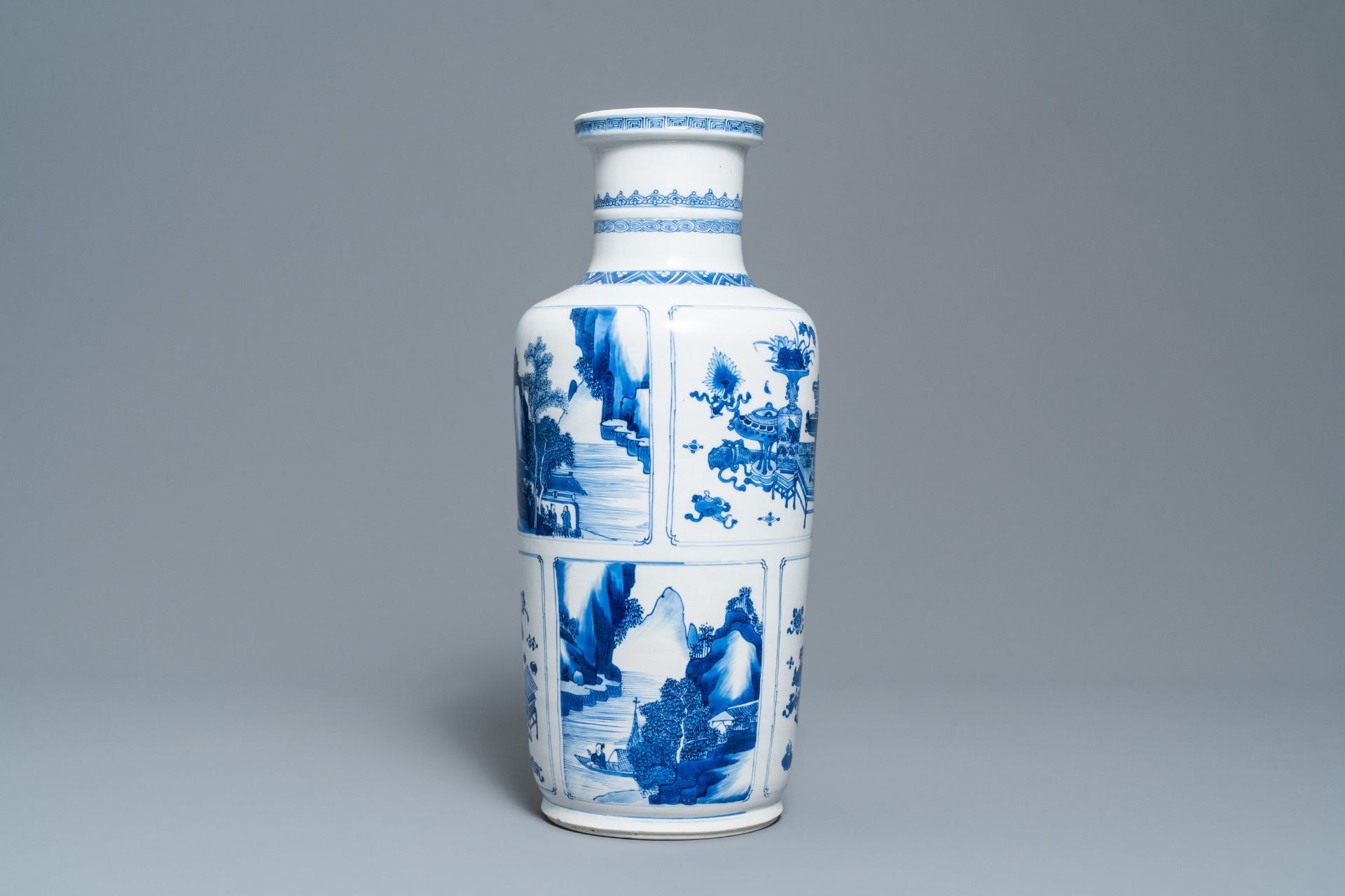 A Chinese blue and white 'antiquities and landscapes' rouleau vase, Kangxi - Image 8 of 35