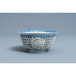 A Chinese blue and white reticulated double-walled bowl, Kangxi