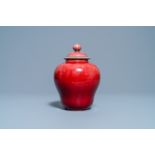 A Chinese monochrome copper red vase and cover, Qianlong/Jiaqing