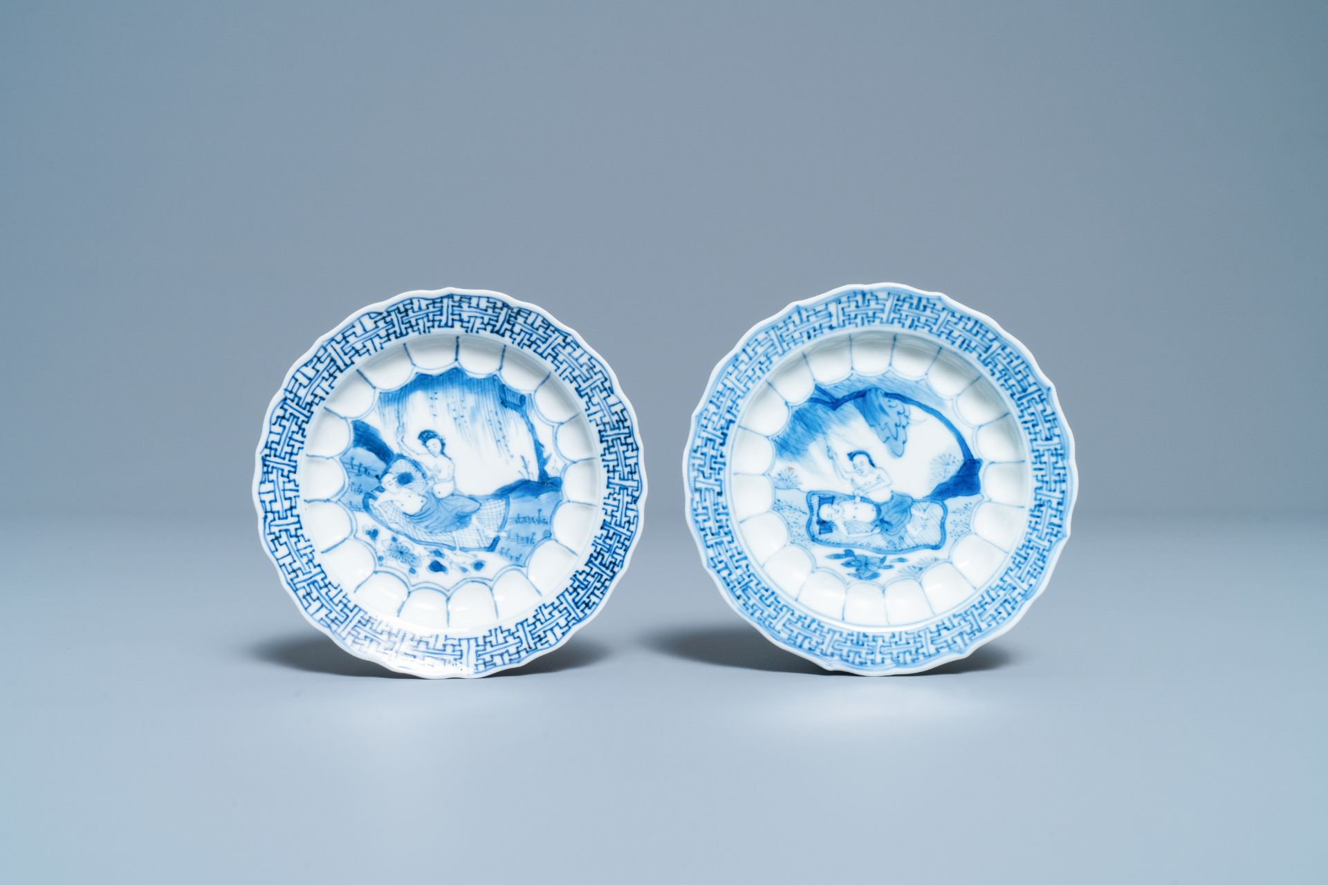 A pair of Chinese blue and white 'acupuncture' saucers, Kangxi - Image 2 of 3