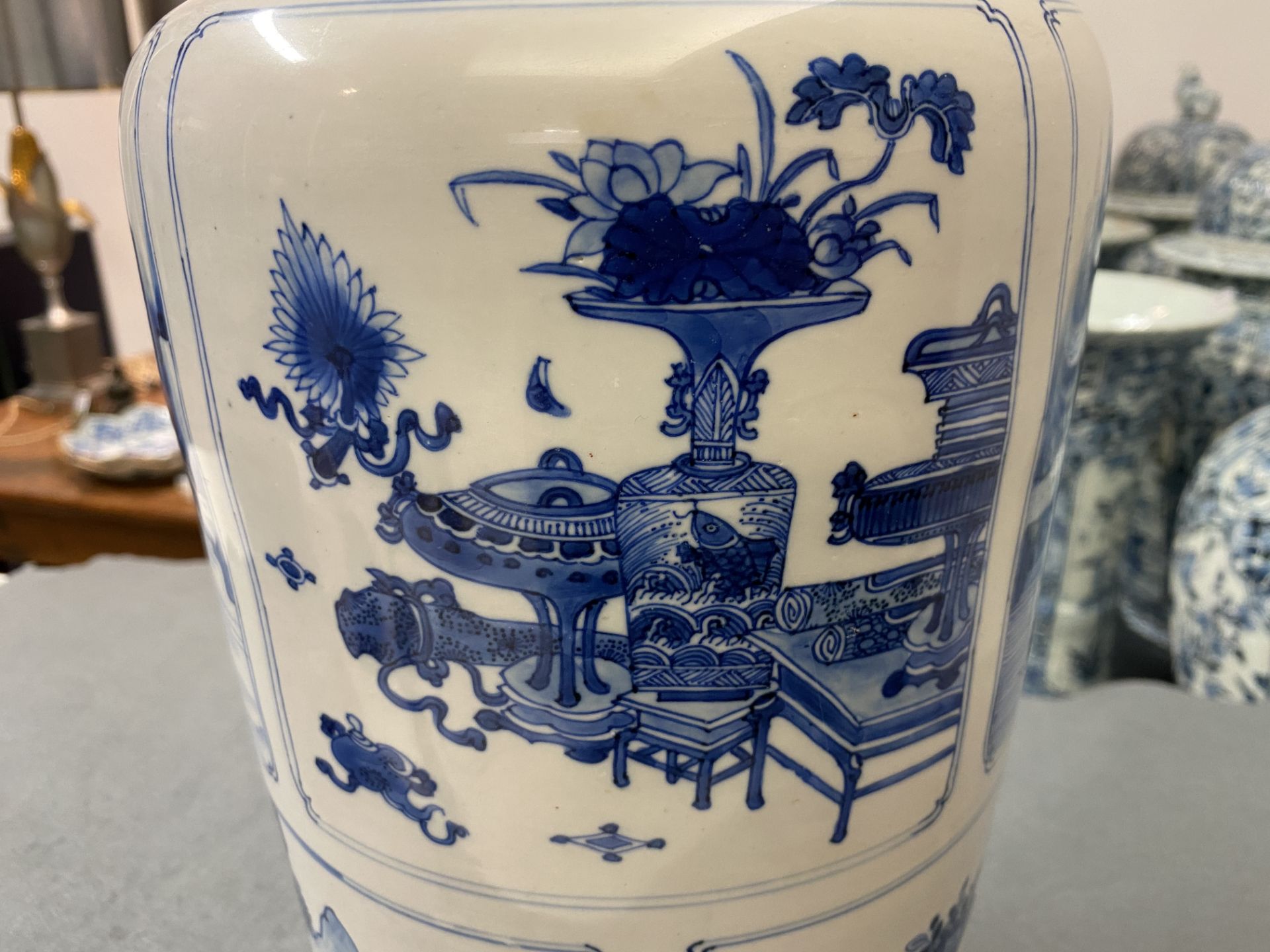 A Chinese blue and white 'antiquities and landscapes' rouleau vase, Kangxi - Image 28 of 35