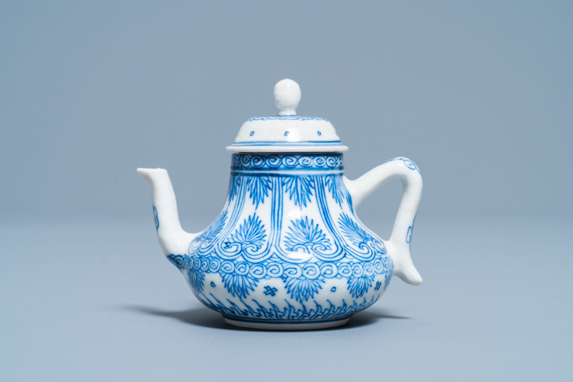 A Chinese blue and white soft paste miniature teapot, Kangxi - Image 2 of 7