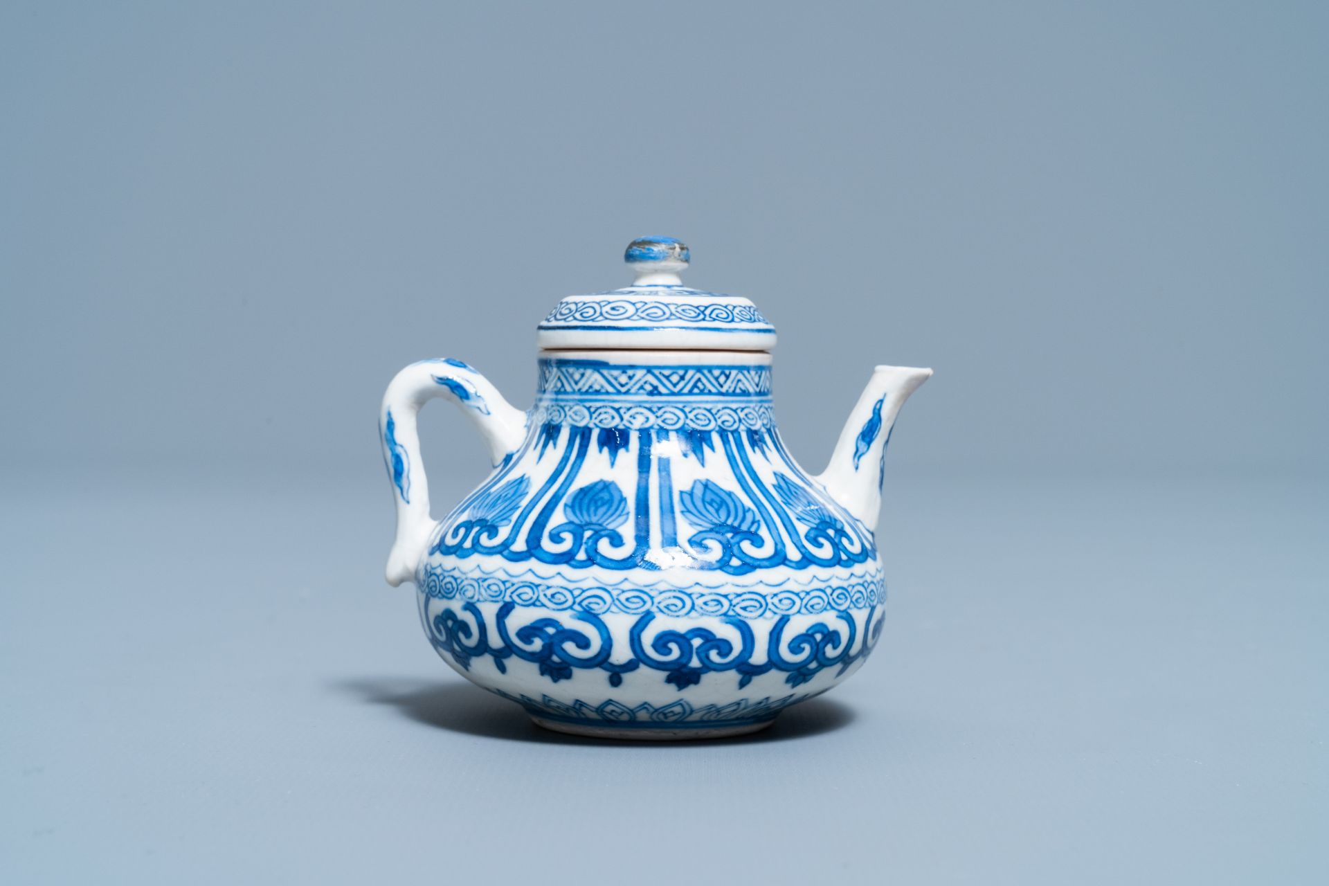 A Chinese blue and white soft paste miniature teapot, Kangxi - Image 4 of 7