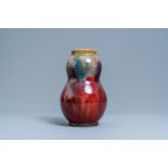 A Chinese flambé-glazed pear-shaped vase, 19th C.