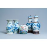 Five Chinese blue and white and famille rose vases, 19th C.