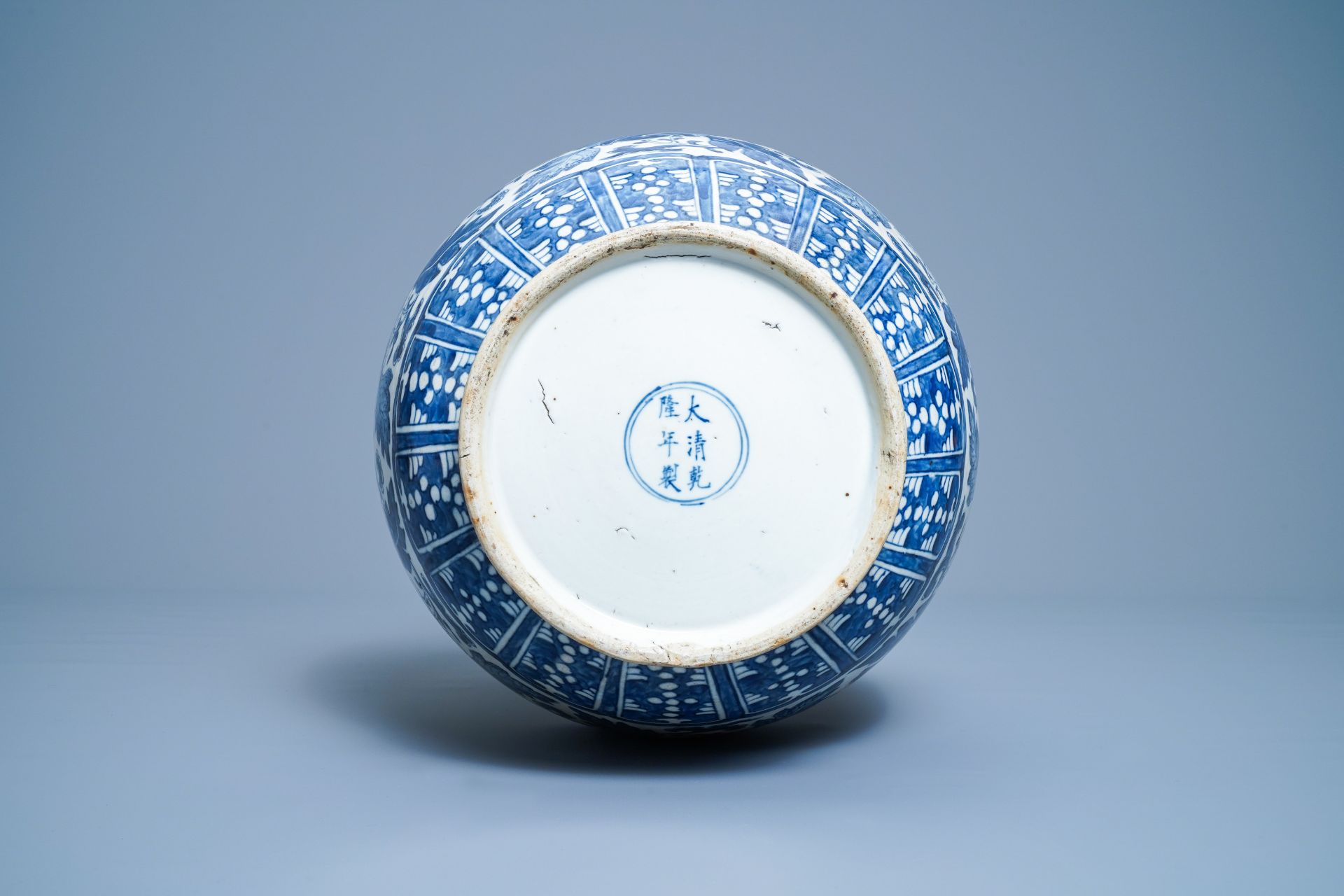 A Chinese blue and white 'hu' vase with floral design, Qianlong mark, 19th C. - Image 6 of 10