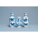 A pair of Chinese blue & white 'mythical beasts' vases & a'dragon and phoenix' vase, 19th C.