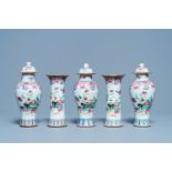 A Chinese famille rose garniture of five vases with antiquities, Qianlong