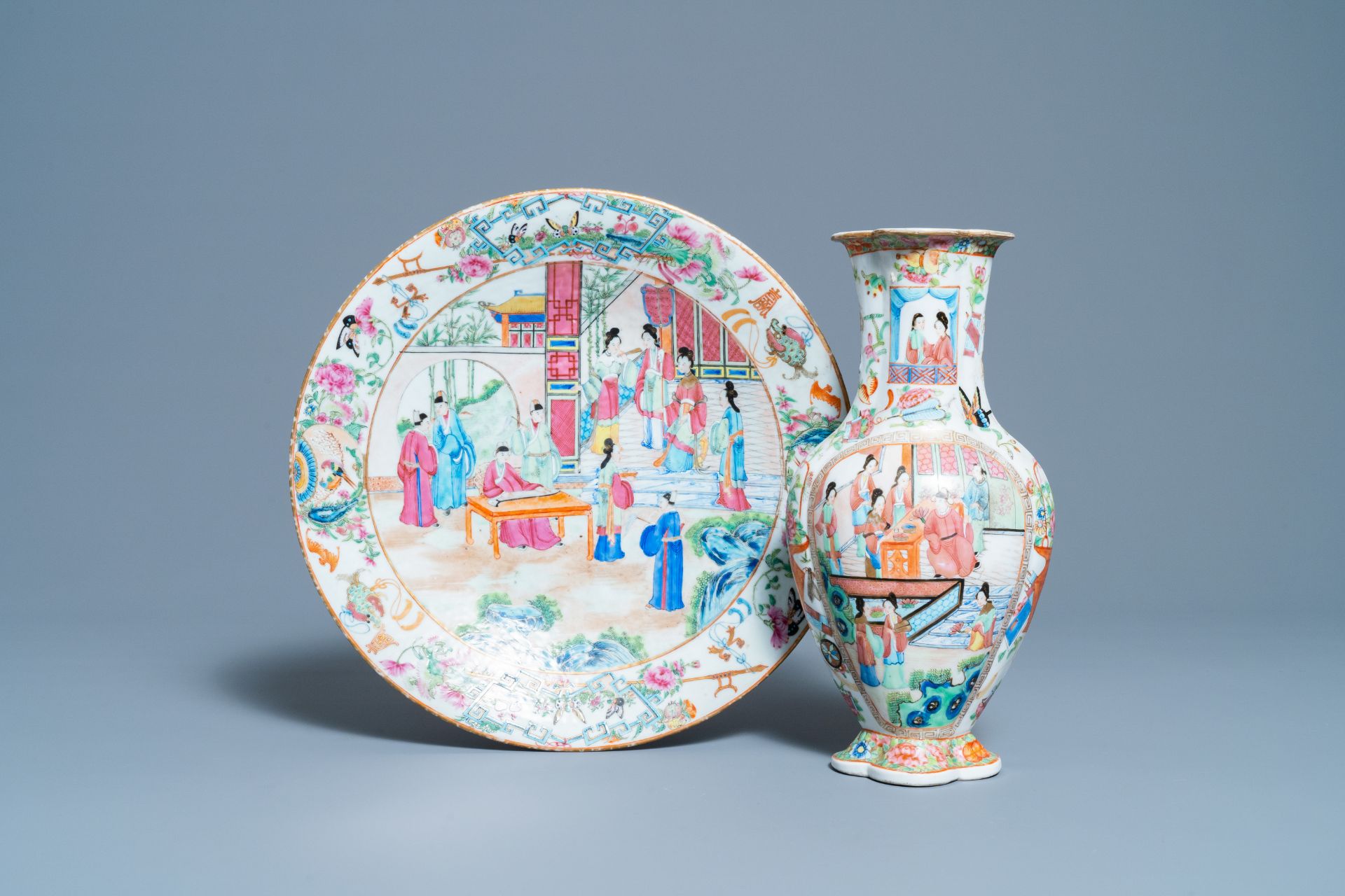 A Chinese Canton famille rose dish and a vase, 19th C.