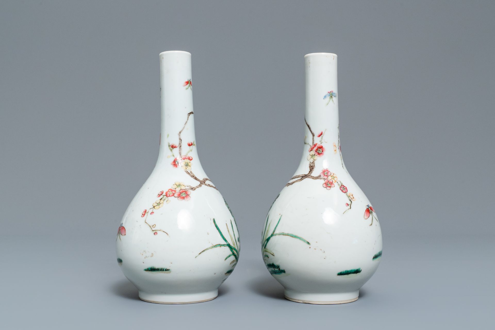 A pair of Chinese famille rose bottle vases, 19th C. - Image 4 of 10