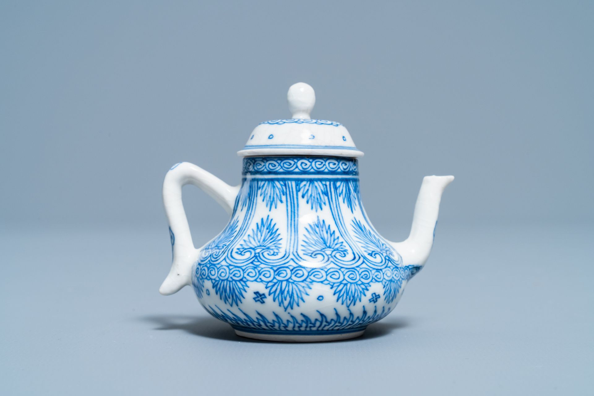 A Chinese blue and white soft paste miniature teapot, Kangxi - Image 4 of 7