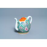 A Chinese famille rose peach-shaped 'cadogan' teapot with applied floral design, Qianlong