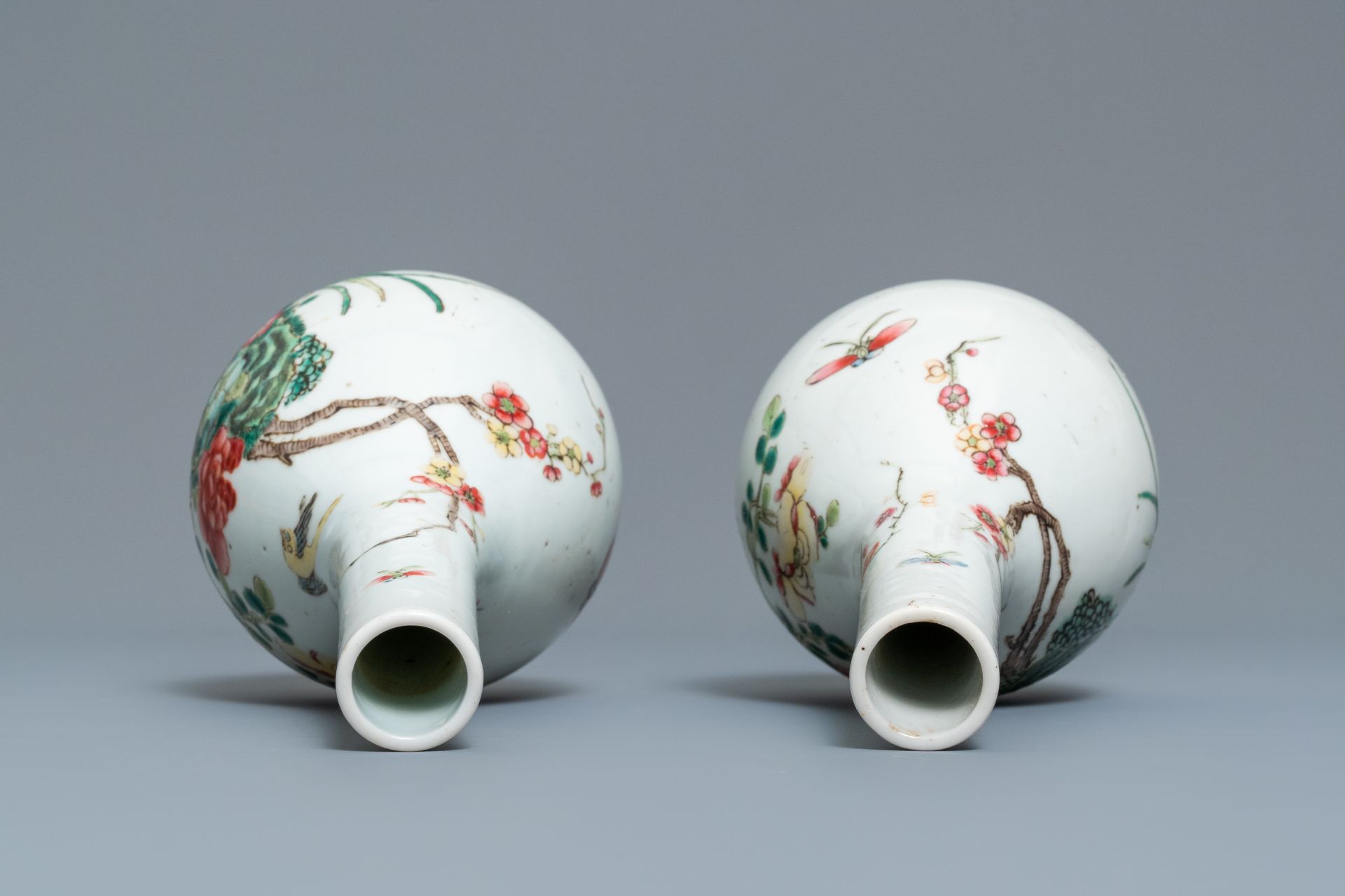 A pair of Chinese famille rose bottle vases, 19th C. - Image 6 of 10