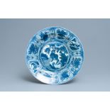 A very large Chinese blue and white kraak porcelain dish with a mythical beast, Wanli