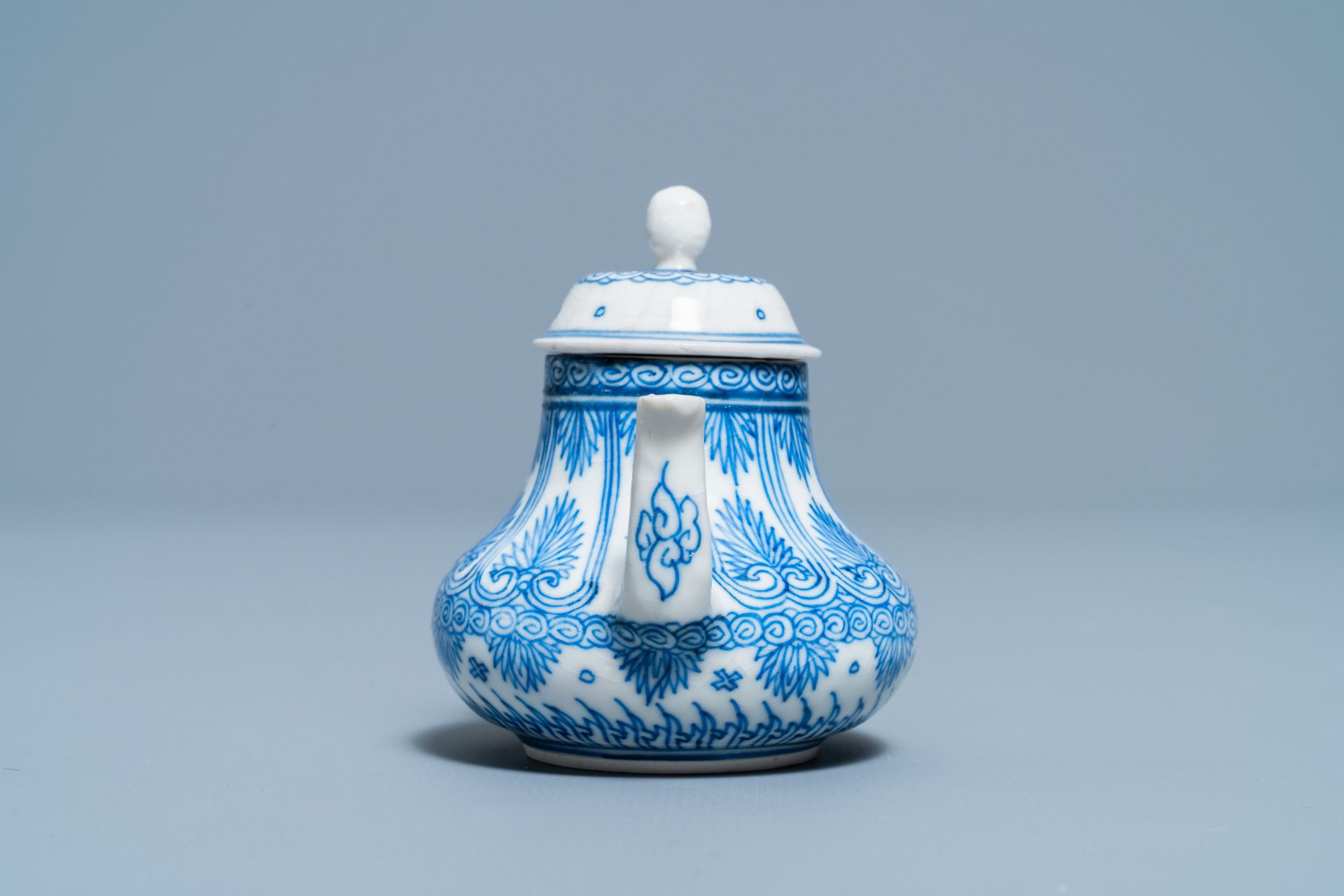 A Chinese blue and white soft paste miniature teapot, Kangxi - Image 5 of 7