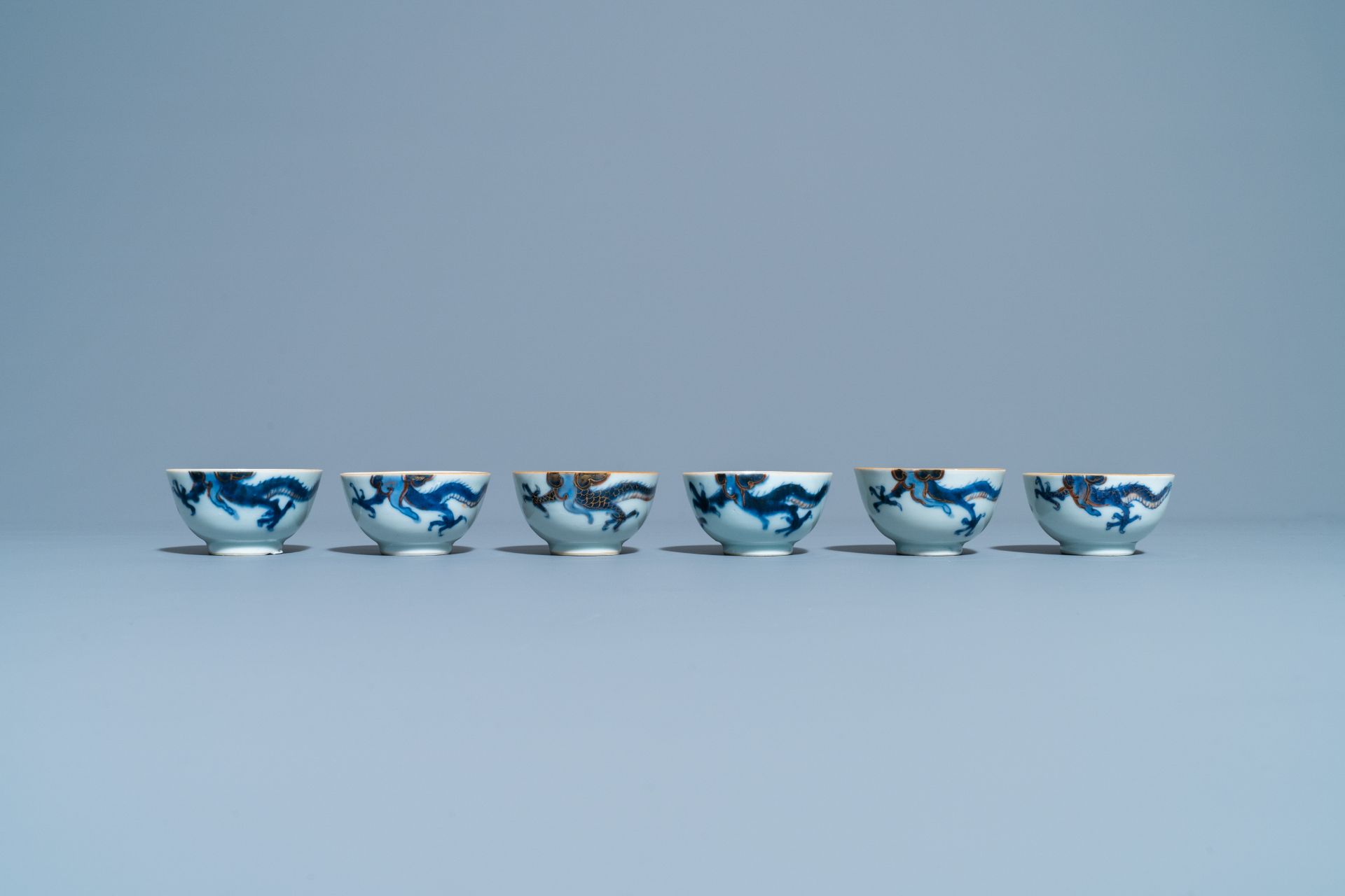 Six Chinese doucai 'dragon' cups and saucers, Kangxi - Image 6 of 11