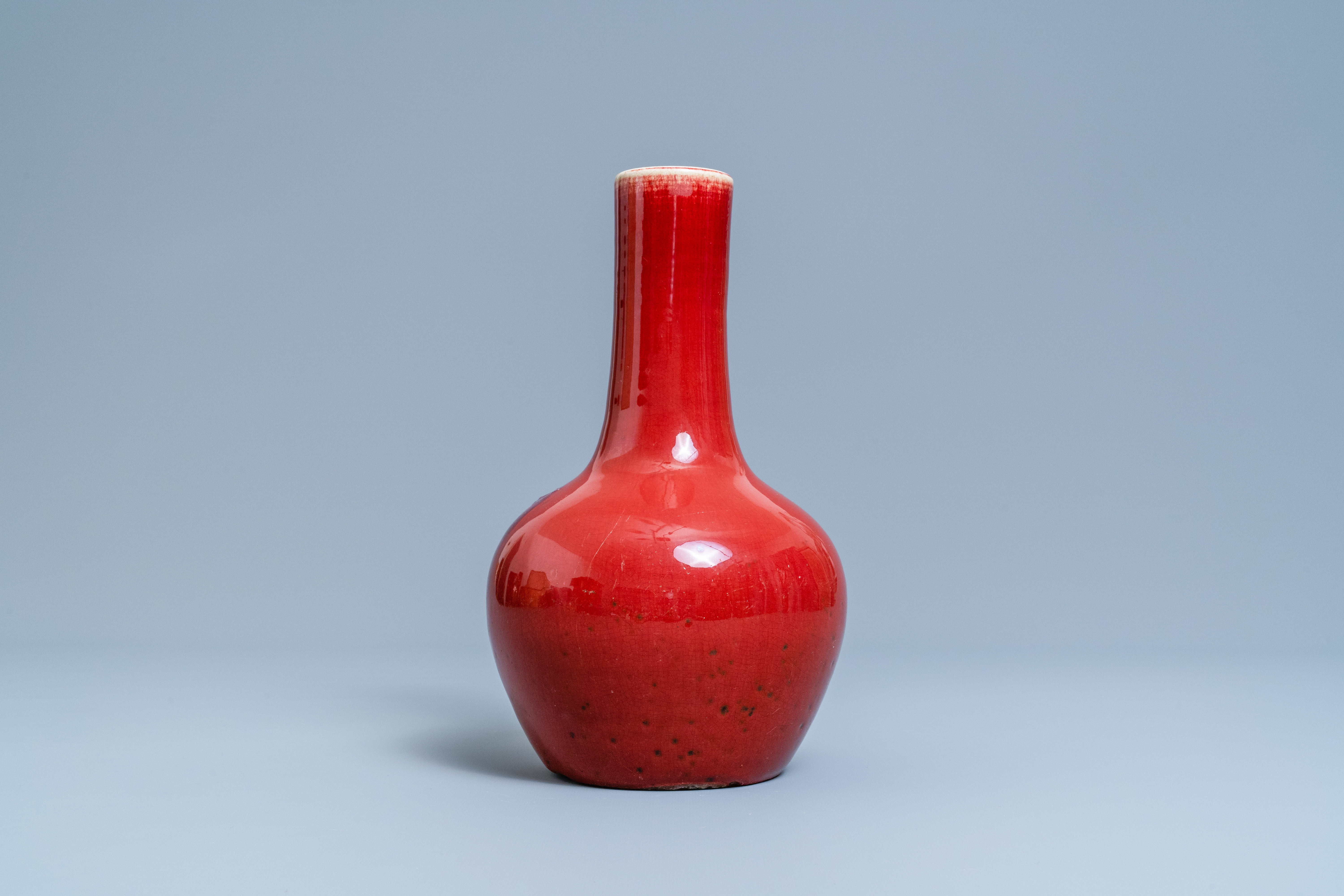 A Chinese monochrome sang de boeuf-glazed bottle vase, 19th C. - Image 3 of 6