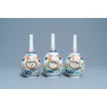 Three Japanese Imari bottle vases with molded panels, Edo, 17/18th C.