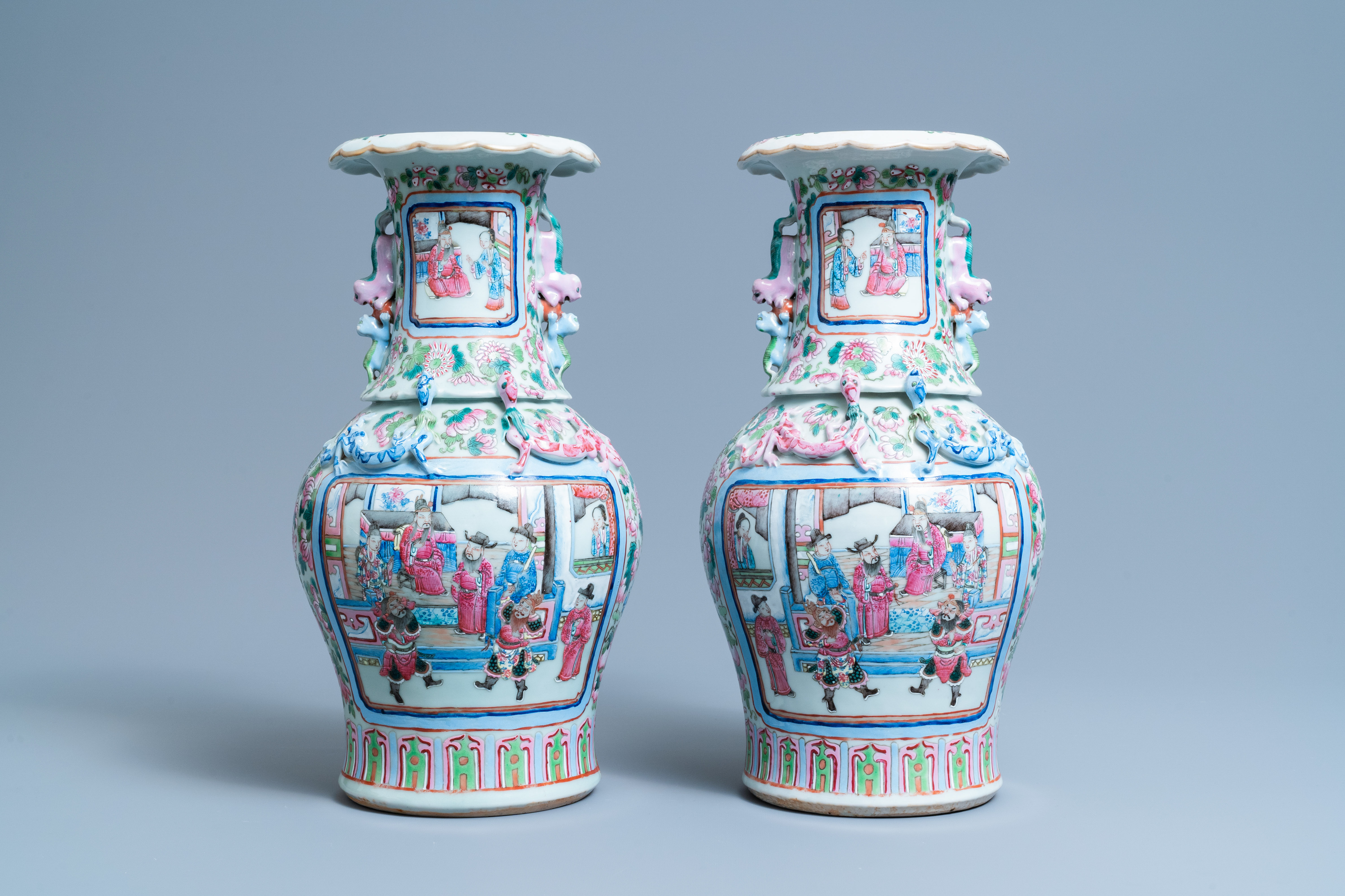 A pair of Chinese famille rose 'court scene' vases, 19th C. - Image 3 of 6