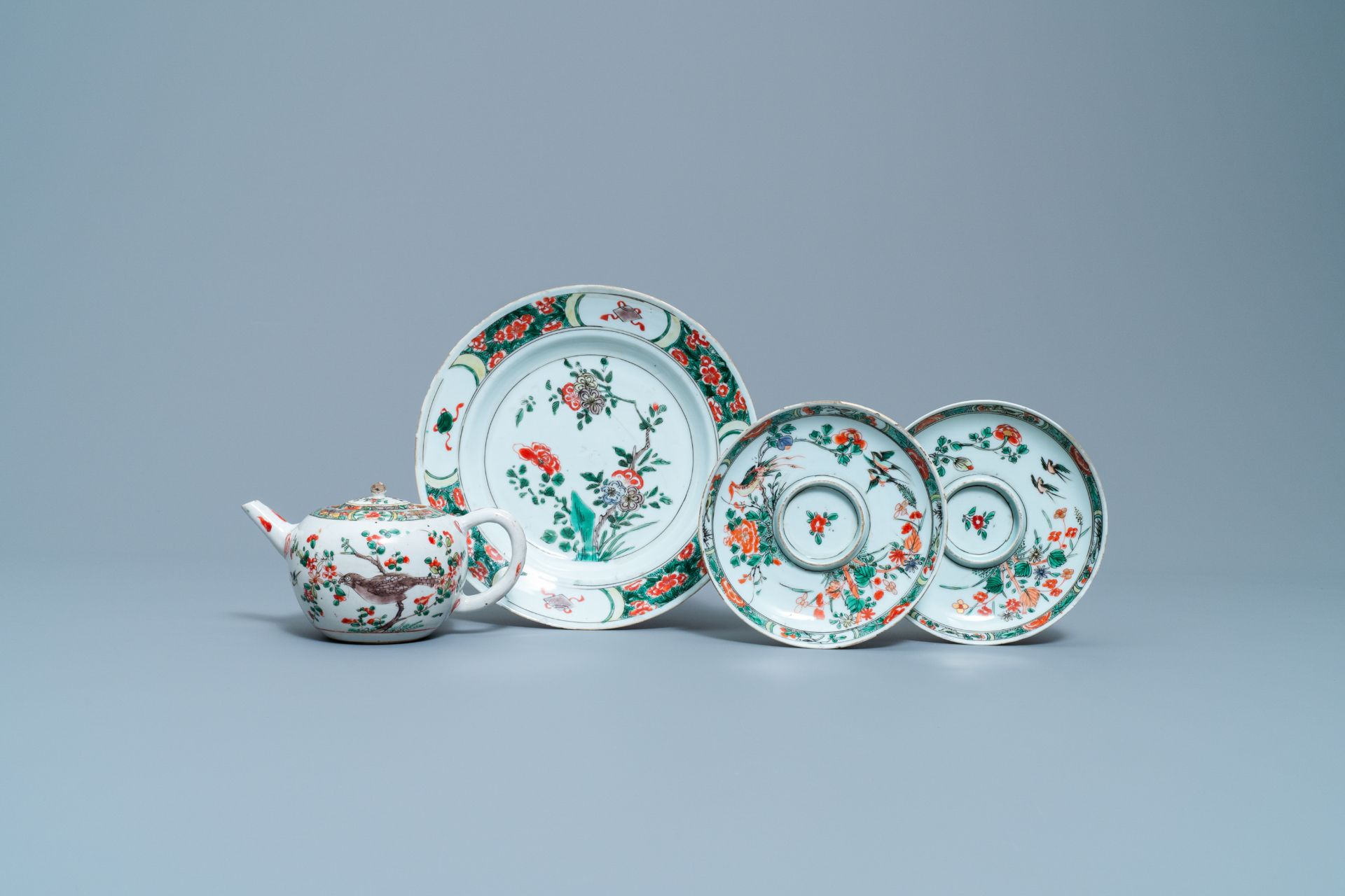 Two Chinese famille verte cup stands, a teapot and a plate, Kangxi